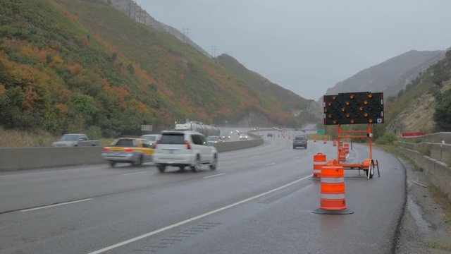 Pan Road Construction Cones In The Rain.