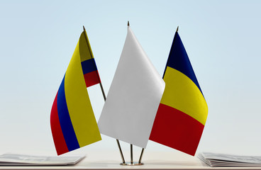 Flags of Colombia and Chad with a white flag in the middle