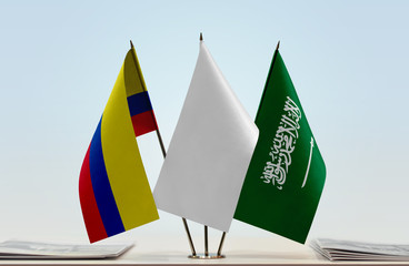 Flags of Colombia and Saudi Arabia with a white flag in the middle
