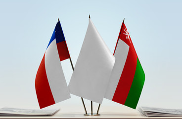 Flags of Chile and Oman with a white flag in the middle