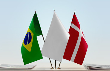 Flags of Brazil and Denmark with a white flag in the middle