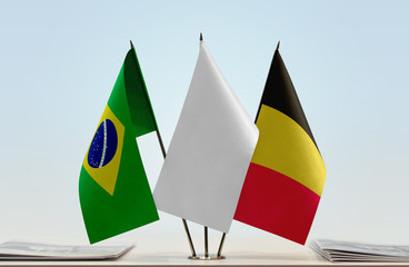 Flags of Brazil and Belgium with a white flag in the middle