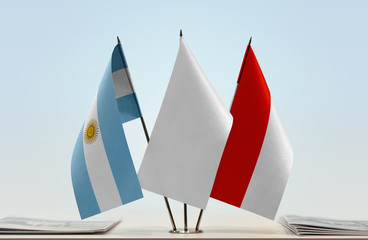 Flags of Argentina and Indonesia with a white flag in the middle