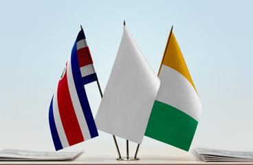 Flags of Costa Rica and Ivory Coast with a white flag in the middle