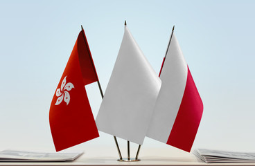 Flags of Hong Kong and Poland with a white flag in the middle