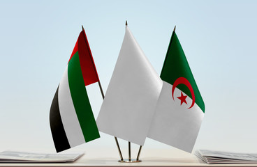 Flags of UAE and Algeria with a white flag in the middle