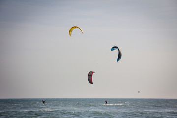 Kitesurfers in action in Barra da Tijuca Beach, Rio de Janeiro