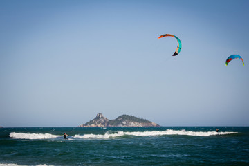 Kitesurfers in action in Barra da Tijuca Beach, Rio de Janeiro