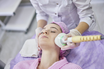 girl in cosmetic procedures of the face