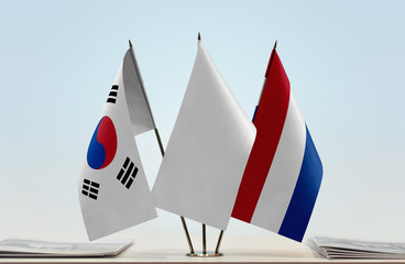 Flags of South Korea and Netherlands with a white flag in the middle