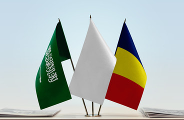 Flags of Saudi Arabia and Chad with a white flag in the middle