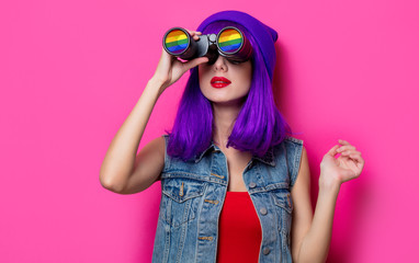 Girl with purple hair and with binoculars