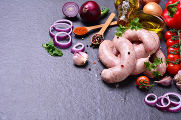 Pork sausages with spices and vegetables