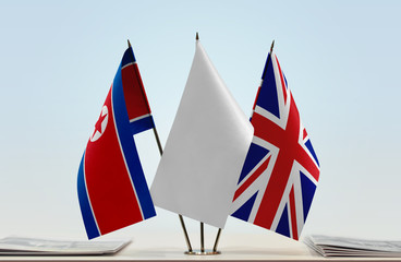 Flags of North Korea and United Kingdom with a white flag in the middle