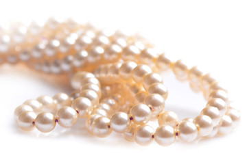 Pearl necklace on a white background