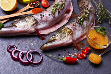 Fish pike with spices and vegetables, and caviar