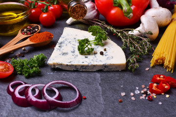 Blue cheese with spices and vegetables