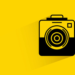 camera on yellow background