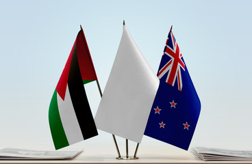 Flags of Jordan and New Zealand with a white flag in the middle