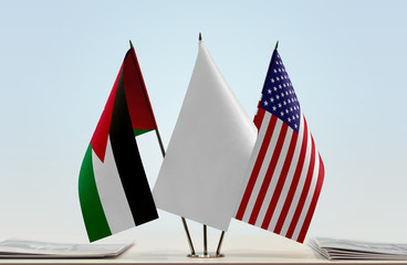 Flags of Jordan and USA with a white flag in the middle