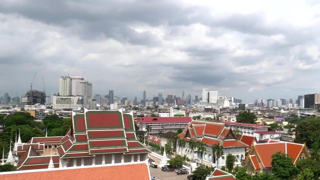 wide pan of bangkok city from golden mount, at wat saket temple in bangkok, thailand