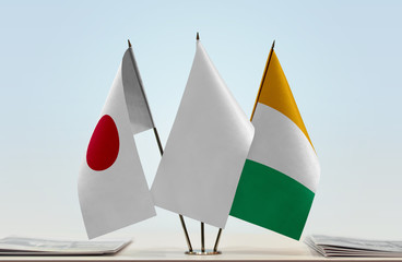 Flags of Japan and Ivory Coast with a white flag in the middle