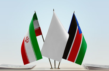 Flags of Iran and South Sudan with a white flag in the middle