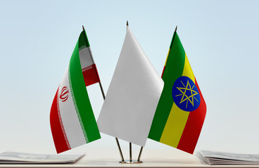 Flags of Iran and Ethiopia with a white flag in the middle