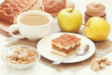 Coffee drink with apple pie and cane sugar on burlap napkin