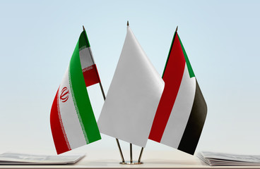 Flags of Iran and Sudan with a white flag in the middle