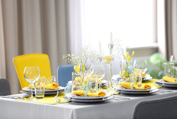 Beautiful Easter table setting with decorations