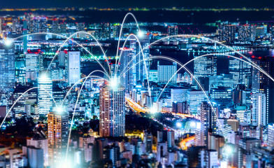 Plakat Business concept for information, communication , connection technology - panoramic modern city skyline, bird eye aerial night view under beautiful dark blue night sky in Roppongi Hill, Tokyo, Japan.