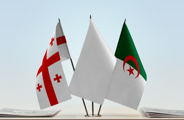 Flags of Georgia and Algeria with a white flag in the middle