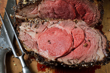 Close up of rib eye steak with vegetables