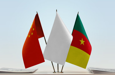 Fototapeta na wymiar Flags of China and Cameroon with a white flag in the middle