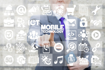 Man presses text button mobile technology on a virtual interface. Mobile Information Multitasking Smart Connection Networking Technologies.