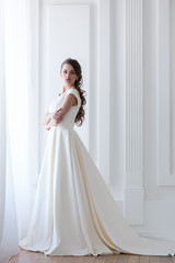 Fototapeta premium beautiful elegant bride in white wedding dress