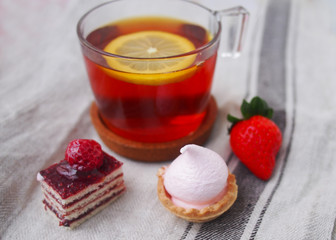 Sweet bar on summer morning. Layer cakes with protein cream and fresh cherry and berries on a cake.
