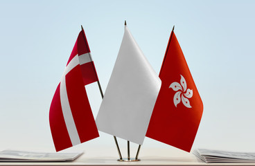 Flags of Denmark and Hong Kong with a white flag in the middle