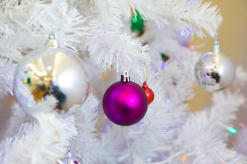 Fototapeta na wymiar glass ball and decorations on Christmas tree