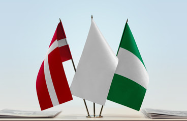 Flags of Denmark and Nigeria with a white flag in the middle