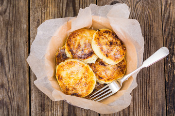 Delicious curd cheese cakes with sugar powder