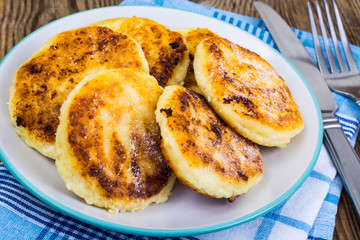 Delicious curd cheese cakes with sugar powder