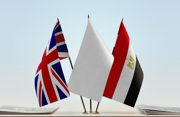 Flags of United Kingdom and Egypt with a white flag in the middle