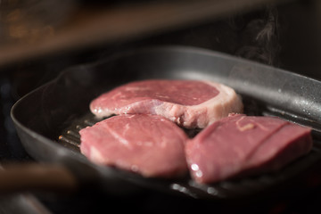 Beef steak fried in pan