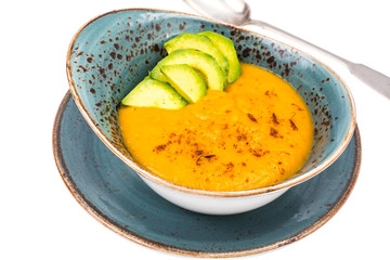 Cream soup pumpkin carrot with avocado