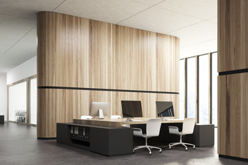 Wooden office corner, black and wooden tables
