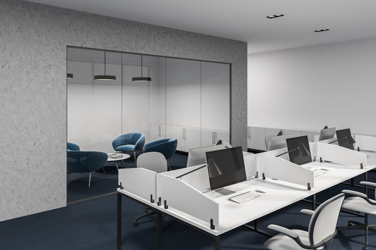 Concrete and white office cubicles