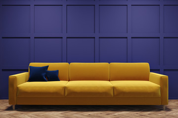 Yellow sofa in a purple room
