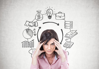 Fototapeta premium Stressed young brunette sitting, business strategy
